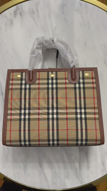 Shop Burberry Small vintage check two-handle title bag (80252741, 8025274)  by Clue