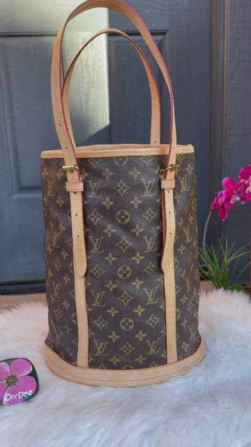 Authentic Louis Vuitton completely relined GM bucket with Cheetah