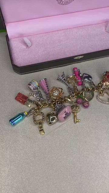 Juicy Couture Jewelry | Juicy Couture Bracelet w/ 17 Charms | Color: Gold/Pink | Size: Os | Pm-26013724's Closet