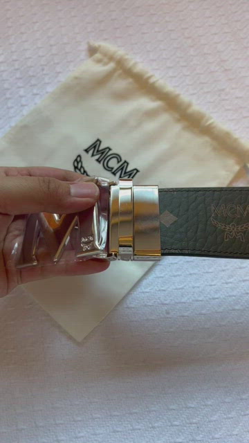 MCM Reversible M Buckle Monogram Belt Denim, $295, Neiman Marcus