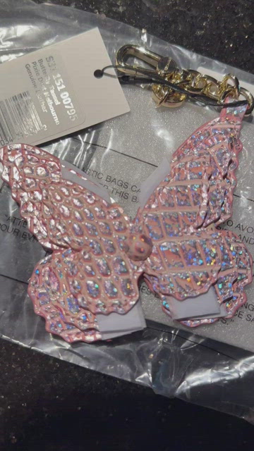 Pink pixie dust Brahmin butterfly popular tassel