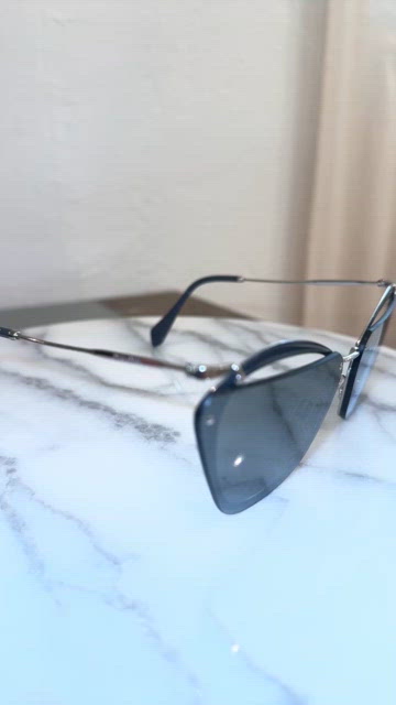 MIU MIU BLACK SILVER GREY CUTOUT SUNGLASSES SMU 54T Miu Miu | Accessories | Miu Miu Black Silver Grey Cutout  main image 4