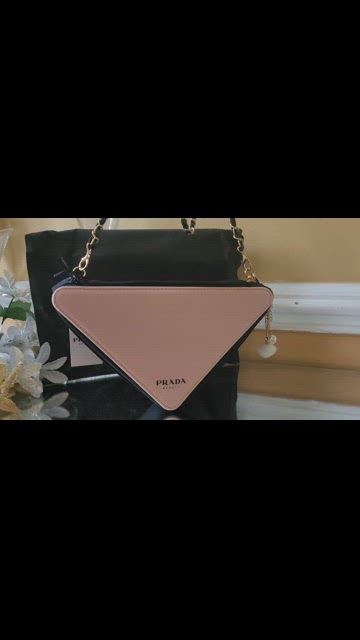 Triangle handbag Prada Pink in Polyester - 33352038