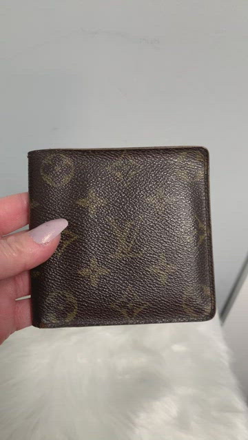 LOUIS VUITTON wallet LUDLOW, collection: 2003 ,price: approx