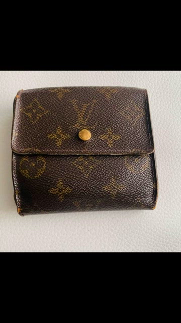 Louis VUITTON year 2010 Compact wallet in Monogram star…