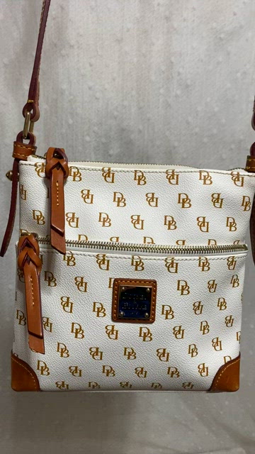 Buy the Dooney & Bourke Sena Stripe Small Drawstring Crossbody Sea Foam