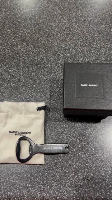 Saint Laurent bottle opener, Saint Laurent