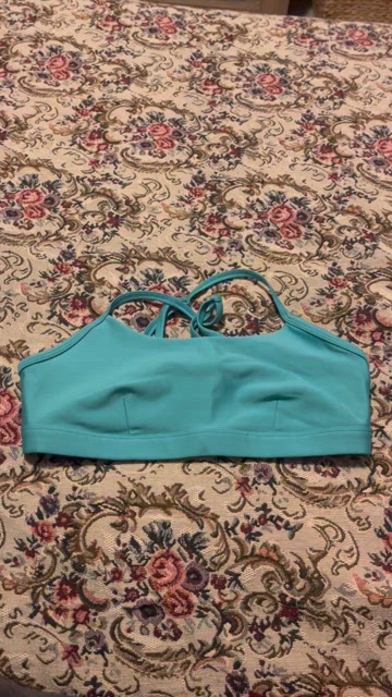 Airlift Intrigue Bra in Ocean Teal by Alo Yoga