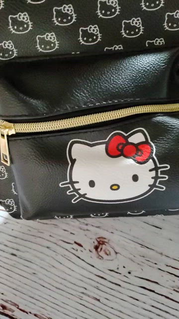hello kitty black leather backpack Fast Forward Pink Bow All Over Print 16in ensuring they can carry their love for this iconic character with them wherever they go Hello Kitty Mini Backpack (Monochrome