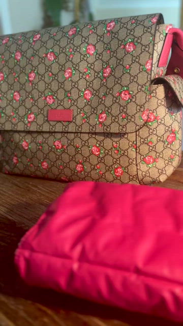 Gucci diaper bag fashion with roses